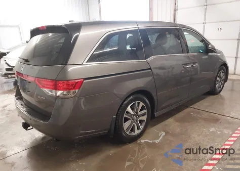 2014 Honda Odyssey Touring/Touring Elite z USA, uszkodzony, nr VIN 5FNRL5H96EB017019